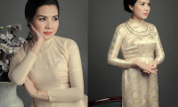Á quân đại sứ áo dài Ngọc Diễm quý bà sang trọng trong áo dài Việt Hùng.